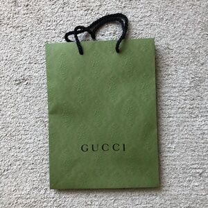 Authentic Gucci Embossed Paper Shopping Bag. I have 3 more for sale.